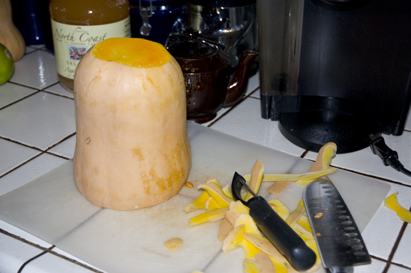 peeling a butternut squash