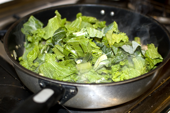 southern greens added to pan