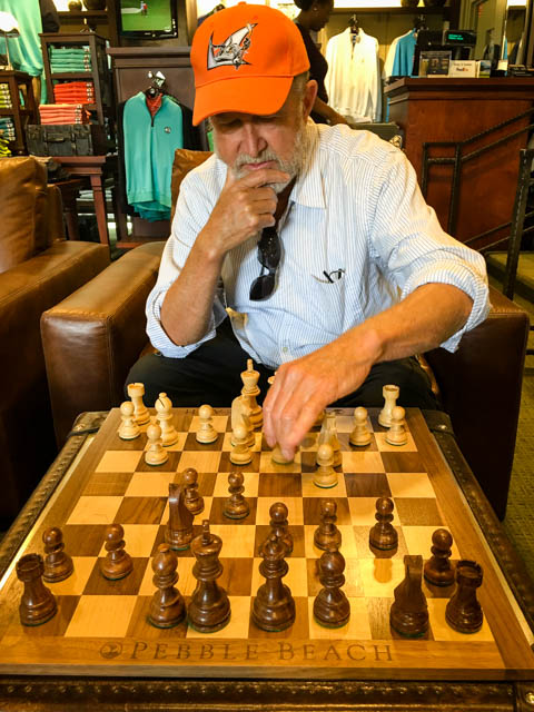 playing chess at Pebble Beach
